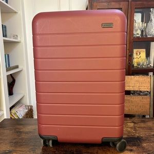 AWAY The Carry-On Luggage in Brick